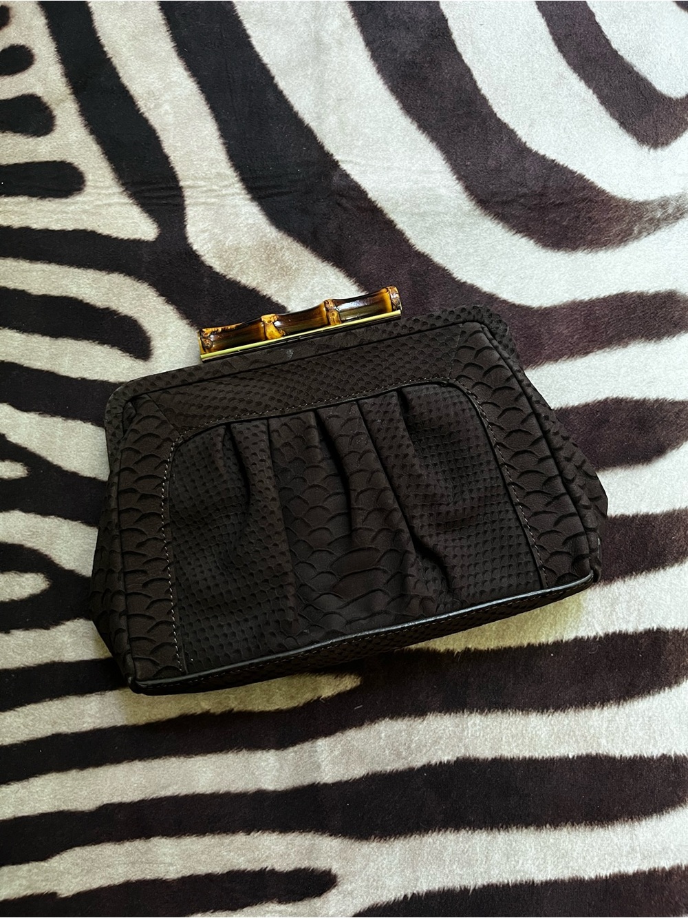 Brown Textured Clutch Handbag with Bamboo Accent.